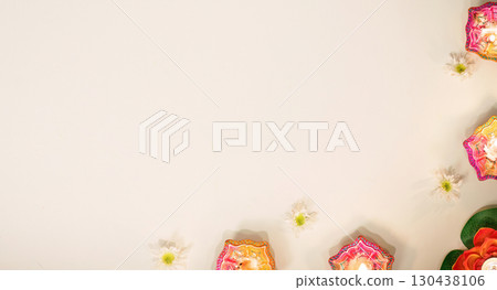 Festive Lighting. Beautiful Diyas and Marigold Flowers for Diwali Celebration 130438106