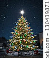 A shining Christmas tree under the starry sky 130439871