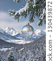 Sparkling Christmas ornaments against the backdrop of snowy mountains 130439872