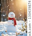 A snowman standing on a snowy field in the early morning 130439874