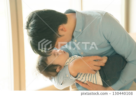 a cuddle, baby, infant 130440108