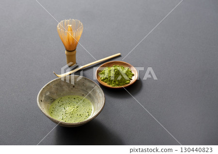 Making matcha. Image of matcha on a black background. 130440823