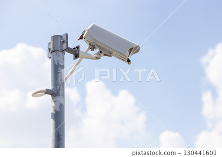CCTV outdoor camera, building security guard. area safety surveillance cam with blue sky background CCTV outdoor camera, building security guard. area safety surveillance cam with blue sky background 130441601