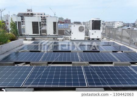 Solar panels installed on the roof of a building 130442063