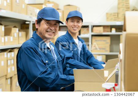 Male worker working in a warehouse 130442067