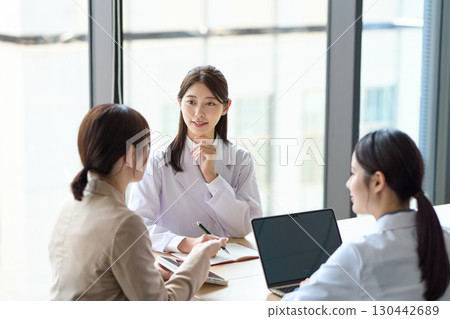 Women in a meeting: medical and sales professionals 130442689