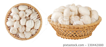 Fresh mushroom champignon in a wicker basket isolated on white background. Top view. Flat lay 130442880