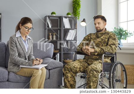Counseling soldier, therapy session for military veteran, PTSD treatment psychotherapy helping 130443829