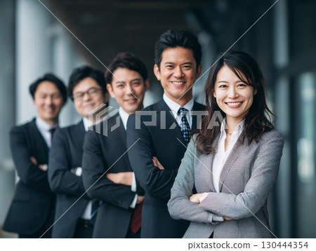 Smiling and confident business people | Team, business, smiles Smiling and confident business people | Team, business, smiles 130444354