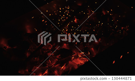 closeup of hot charcoal in dark environment closeup of hot charcoal in dark environment 130444871