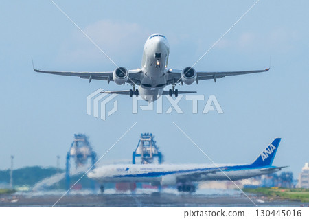 Passenger plane taking off from Haneda Airport Passenger plane taking off from Haneda Airport 130445016
