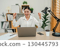 success woman working with laptop computer at home office 130445793
