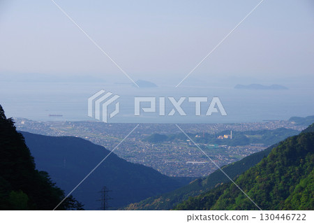 View of Niihama city from the Tonodaira area of the former Besshi Copper Mine in Ehime Prefecture View of Niihama city from the Tonodaira area of the former Besshi Copper Mine in Ehime Prefecture 130446722