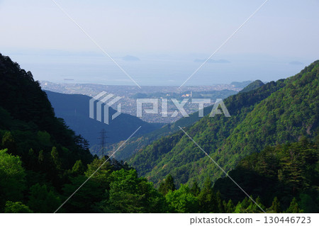 View of Niihama city from the Tonodaira area of the former Besshi Copper Mine in Ehime Prefecture View of Niihama city from the Tonodaira area of the former Besshi Copper Mine in Ehime Prefecture 130446723