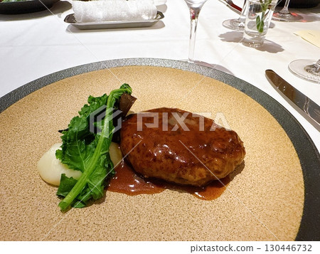 Hamburg steak and vegetables in a simple arrangement 130446732