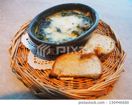 Pumpkin gnocchi and spinach gratin Pumpkin gnocchi and spinach gratin 130446880