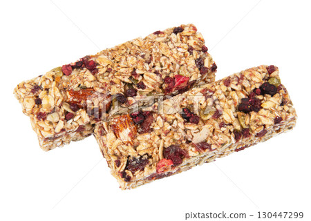 Granola bar cereal superfood energy nuts with berries isolated on white background Granola bar cereal superfood energy nuts with berries isolated on white background 130447299