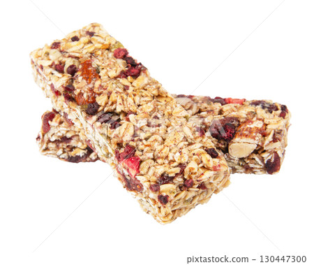 Granola bar cereal superfood energy nuts with berries isolated on white background Granola bar cereal superfood energy nuts with berries isolated on white background 130447300