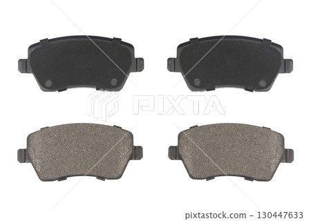 Auto brake pads isolated on white background. Set of brake pads. New auto spare parts isolated on white background Auto brake pads isolated on white background. Set of brake pads. New auto spare parts isolated on white background 130447633