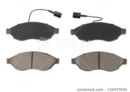 Auto brake pads isolated on white background. Set of brake pads. New auto spare parts isolated on white background Auto brake pads isolated on white background. Set of brake pads. New auto spare parts isolated on white background 130447640