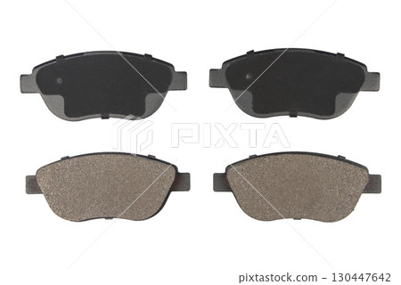Auto brake pads isolated on white background. Set of brake pads. New auto spare parts isolated on white background Auto brake pads isolated on white background. Set of brake pads. New auto spare parts isolated on white background 130447642