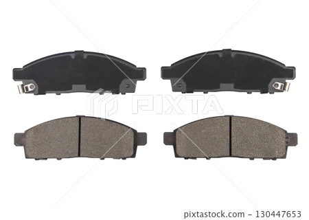 Auto brake pads isolated on white background. Set of brake pads. New auto spare parts isolated on white background Auto brake pads isolated on white background. Set of brake pads. New auto spare parts isolated on white background 130447653