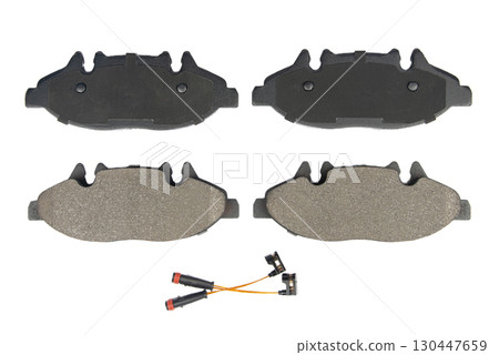 Auto brake pads isolated on white background. Set of brake pads. New auto spare parts isolated on white background Auto brake pads isolated on white background. Set of brake pads. New auto spare parts isolated on white background 130447659
