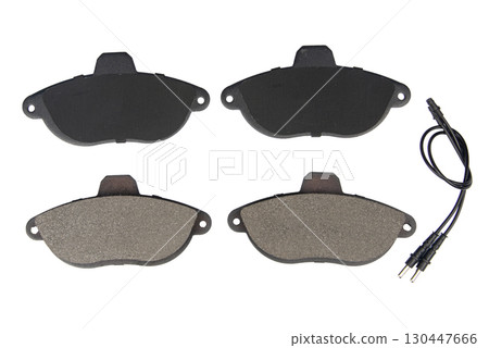 Auto brake pads isolated on white background. Set of brake pads. New auto spare parts isolated on white background Auto brake pads isolated on white background. Set of brake pads. New auto spare parts isolated on white background 130447666