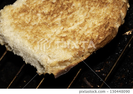 Close up of toasted burger bun being grilled Close up of toasted burger bun being grilled 130448090