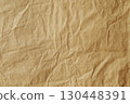 Macro focus of brown crumpled stained paper texture 130448391