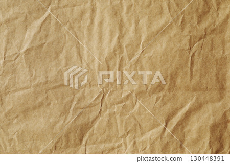 Macro focus of brown crumpled stained paper texture 130448391
