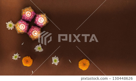 Diwali Candle Arrangement with Marigold Flowers 130448626