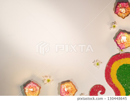 Elegant Diwali candle display with floral decorations and vibrant colors Elegant Diwali candle display with floral decorations and vibrant colors 130448645