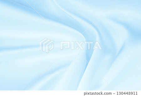 Smooth elegant blue silk or satin luxury cloth texture as abstract background. Luxurious background design 130448911