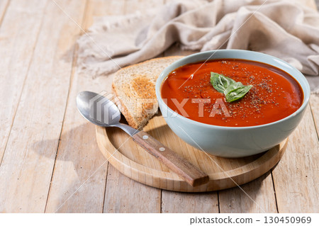 Homemade Tomato Soup in bowl with Basil Homemade Tomato Soup in bowl with Basil 130450969