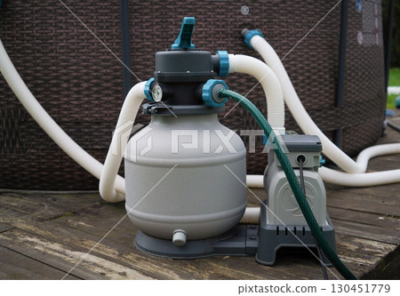 The outdoor pool's filtration and ozone generator pump for water cleanliness. 130451779