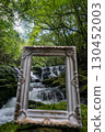 A waterfall leading to the Kikuchi Gorge with a clear stream flowing through nature 130452003