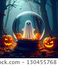 Glowing ghost inside a Halloween snow globe with pumpkins in a dark enchanted forest. 130455768