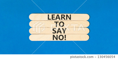Learn to say no symbol. Concept words phrase Learn to say no on beautiful wooden stick. Beautiful blue paper background. Business psychological Learn to say no concept. Copy space. Learn to say no symbol. Concept words phrase Learn to say no on beautiful wooden stick. Beautiful blue paper background. Business psychological Learn to say no concept. Copy space. 130456054