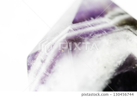 Beautiful close up of quartz crystal rock shard with reflective rainbow spiritual light Beautiful close up of quartz crystal rock shard with reflective rainbow spiritual light 130456744