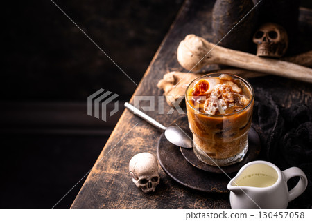 Halloween coffee with ice in shape of skull 130457058