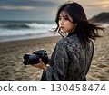 Cameraman blowing in the wind 130458474