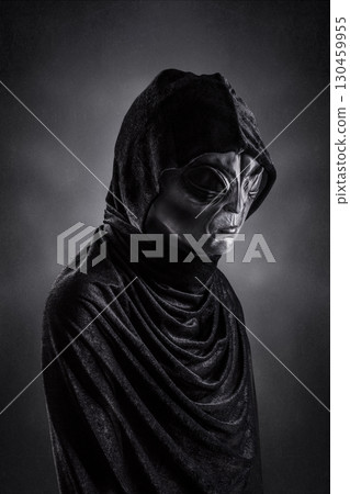 Mysterious humanoid alien at night over dark misty background Mysterious humanoid alien at night over dark misty background 130459955