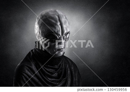 Mysterious humanoid alien at night over dark misty background 130459956