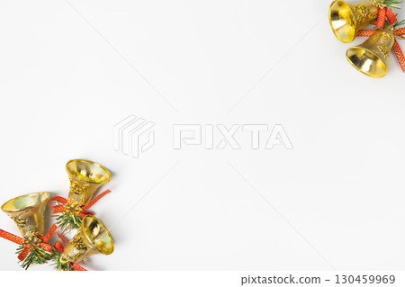 Christmas background with golden bells and space for text, greetings, promotions, and discounts. Christmas and New Year card. Flat lay, copy space 130459969