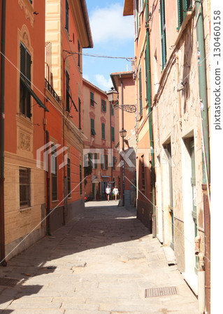 Old street in Italian countryside near sea. Traditional building. Sun day. Entrance, window to house. Nature and sky 130460158