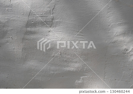 Wall with texture and shadows. Grey concrete background Wall with texture and shadows. Grey concrete background 130460244