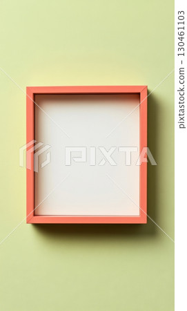 Minimalist coral frame on pastel green wall with empty white space for artwork 130461103