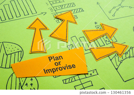Charts with the words plan or improvise symbolizes business strategy. 130461356