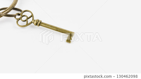 old vintage key isolated on a white background old vintage key isolated on a white background 130462098